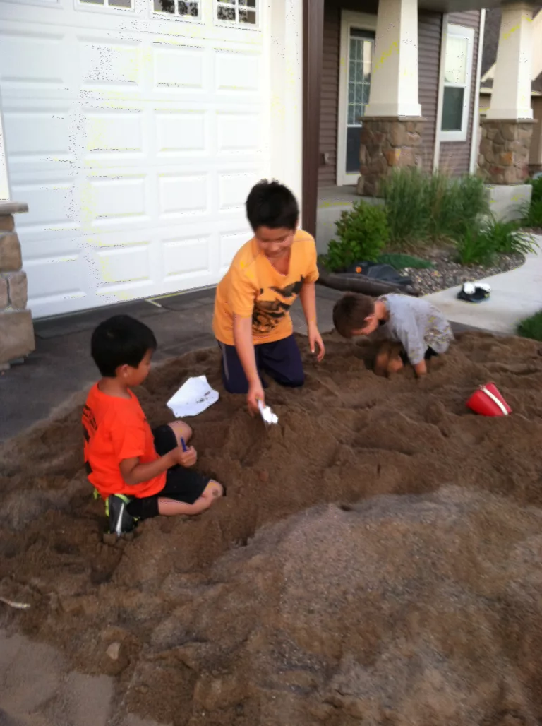 Evan, Nathan, Miles in dirt next door